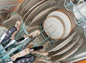 clean dishes loaded into a dishwasher